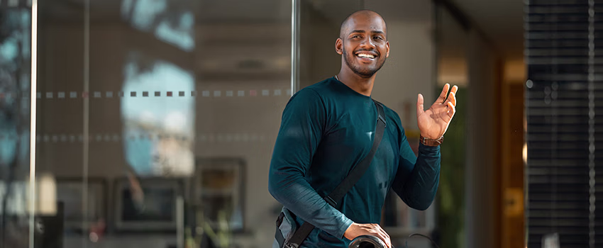 office employee waving goodbye