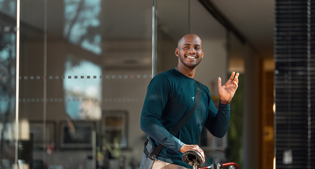 office employee waving goodbye