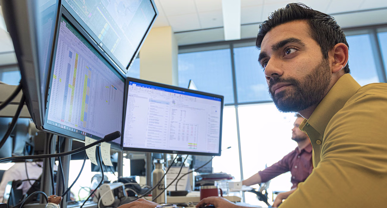 an employee looking at her monitor