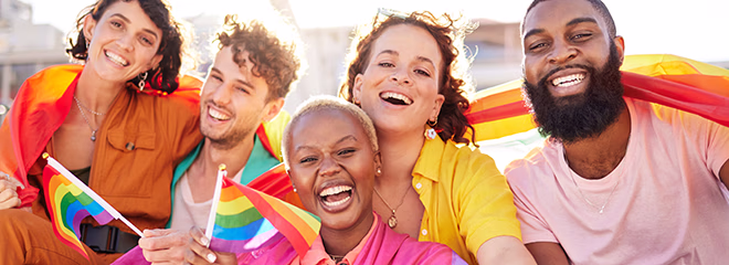 Portrait, diversity and rainbow flag for lgbtq community, freedom and smile for parade, support or solidarity